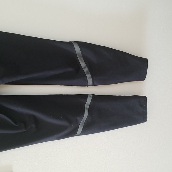 Fila Women's sport leggings with reflector strips zippers at bottom - Picture 6 of 7